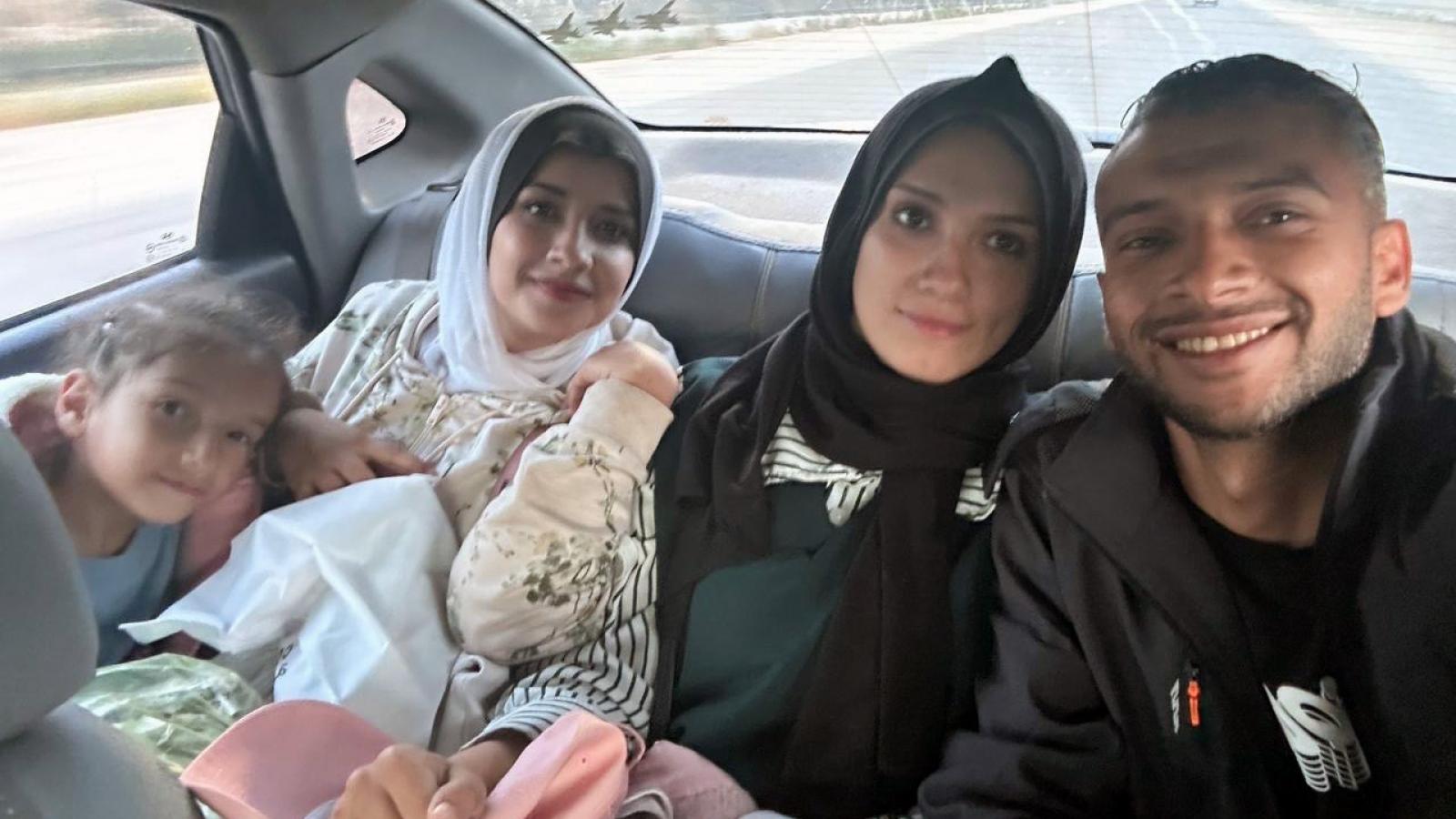Yousef Hammash in a car with members of his family
