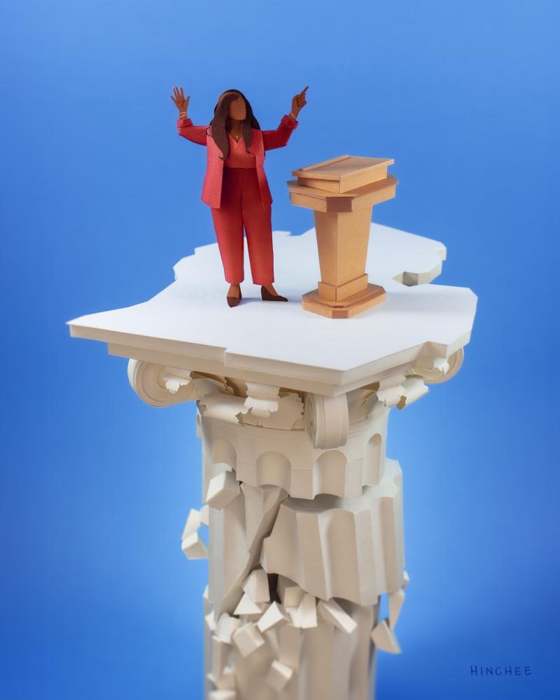 A woman in red stands on top of a crumbling tower, the top of which is in the shape of Michigan